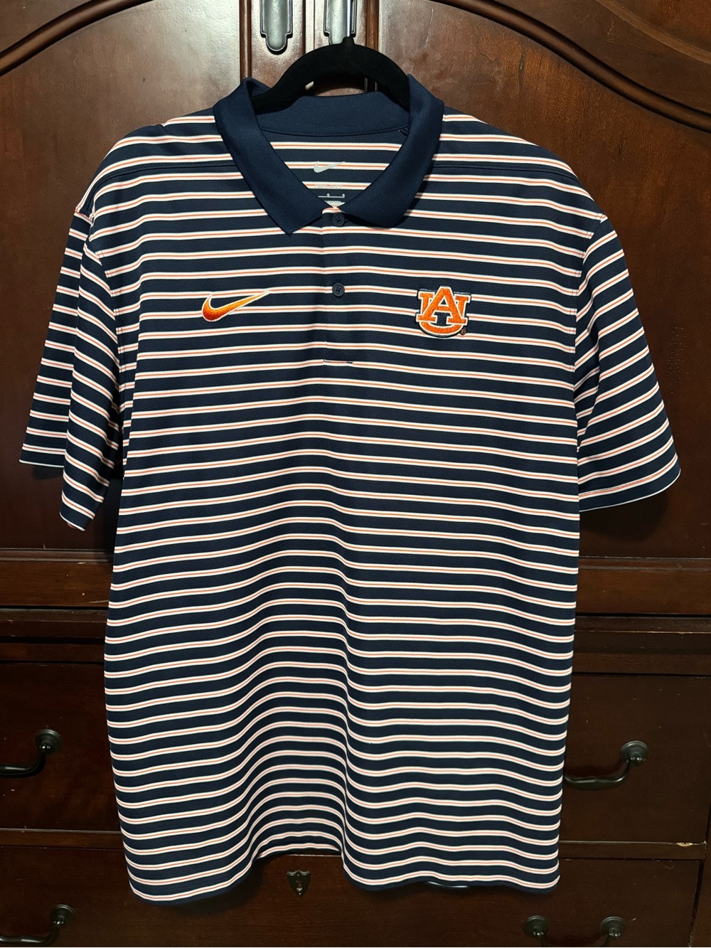 Nike Navy & White Striped Polo with Orange Accents